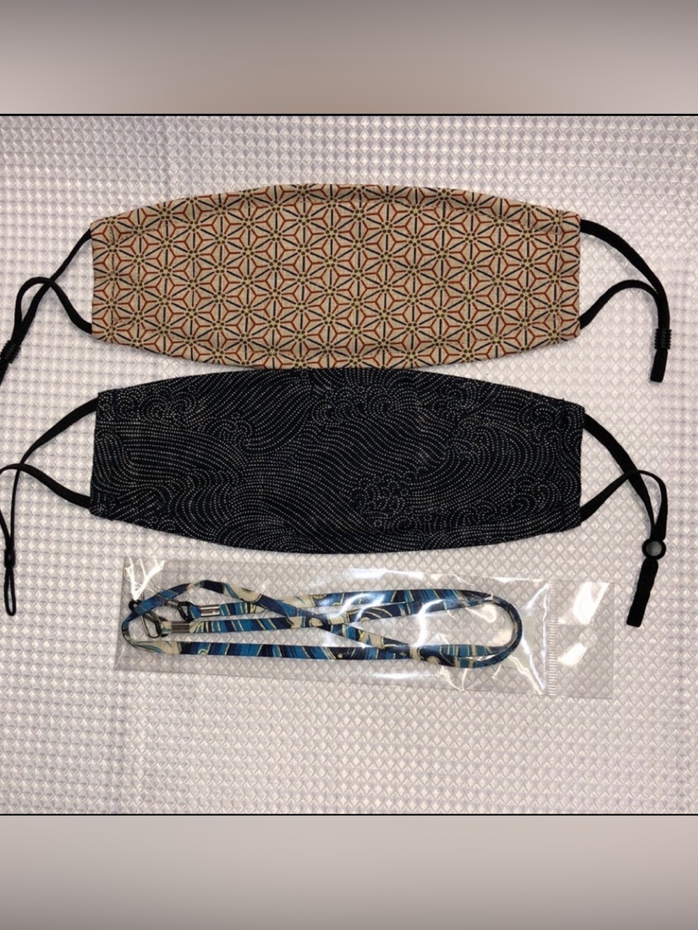 2 Masks: Tan Geometric & Black Micron Dot Elastic Bi-fold & 1 Blue Clip Holder